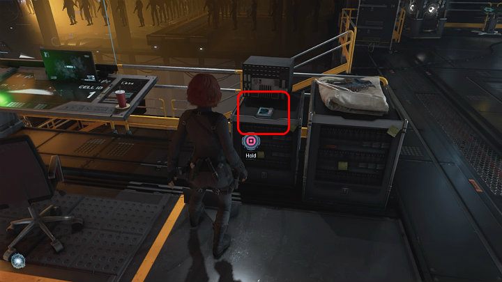 Przejdź przez hangar, w którym maszyny produkują Adaptoidy i podejdź do stanowiska komputerowego - Marvels Avengers: Samotna walka - sekrety, znajdźki - Marvels Avengers - poradnik do gry