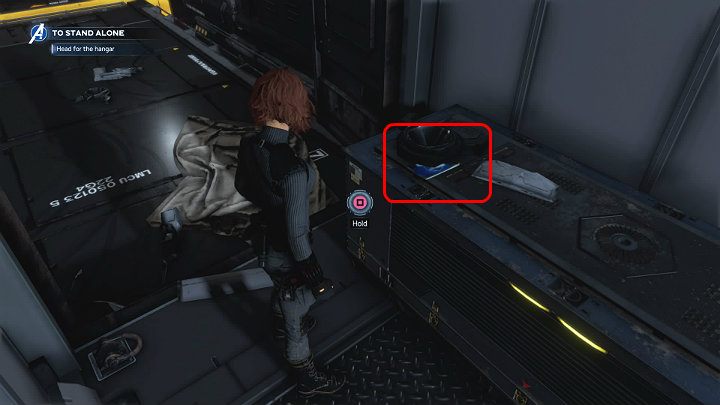 Na skrzyni po lewej stronie znajdziesz komiks Czarnej Wdowy - Marvels Avengers: Samotna walka - sekrety, znajdźki - Marvels Avengers - poradnik do gry