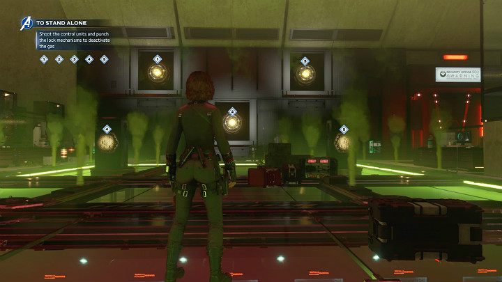 Na ścianie pomieszczenia pojawią się trzy jednostki kontrolne w które trzeba będzie strzelić (cyfry 1, 2 i 3), by je dezaktywować - Marvels Avengers: Samotna walka/To stand alone - solucja, opis przejścia - Marvels Avengers - poradnik do gry