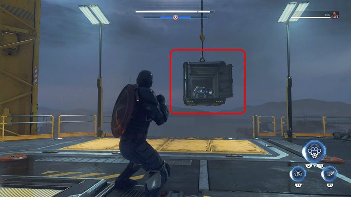 Gdy będziesz na górze w pierwszej kolejności odwróć się w lewo, a zauważysz otwarty kontener, który został podwieszony na linie w dość znacznej odległości od platformy - Marvels Avengers: Siłą umysłu/By Force of Mind - solucja, finałowy boss - Marvels Avengers - poradnik do gry