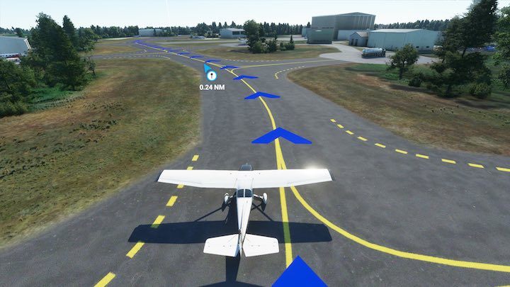 Na ogromnych lotniskach można się łatwo pogubić. Podświetlone trasy, niczym w grach wyścigowych, bardzo ułatwiają poruszanie się na lądzie. - Flight Simulator: Realizm, ułatwienia - poziomy trudności - Microsoft Flight Simulator 2020 - poradnik do gry