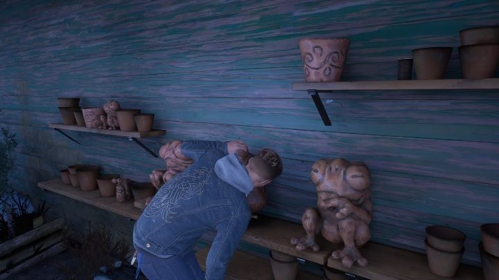 Udaj się do figur żab, postawionych przy lewej stronie budynku gospodarczego - Tell Me Why: Wejście do domu - solucja, opis przejścia - 1 Rozdział - Tell Me Why - poradnik do gry