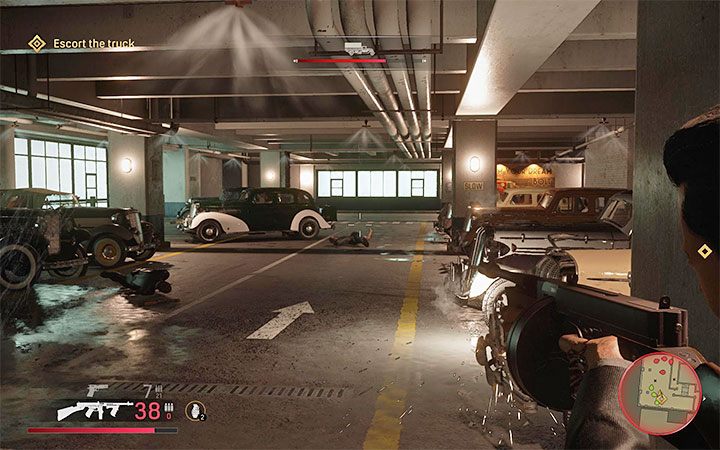 Kontynuuj przebijanie się na niższe piętra parkingu i spodziewaj się konieczności eliminowania nowych gangsterów - Mafia Definitive Edition: Ważna sprawa - solucja - Mafia 1 Definitive Edition - poradnik, solucja