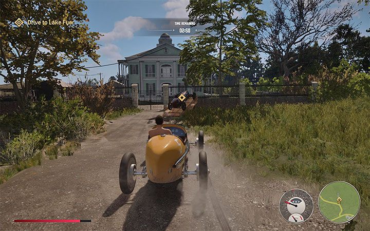 Nowy punkt podmiany środków transportu znajduje się przed posiadłością na wzgórzu, do której prowadzi kilka ostrych zakrętów - Mafia Definitive Edition: The Old Switcheroo - solucja - Mafia 1 Definitive Edition - poradnik, solucja