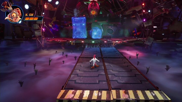 Pamiętaj, aby po każdym wślizgu trochę się cofnąć - Crash 4: N. Gin (Sceniczny Debiut) - boss, jak pokonać - Crash Bandicoot 4 - poradnik, solucja