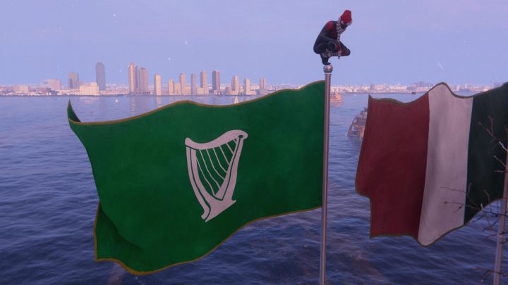 W dzielnicy Midtown, przed budynkiem ambasady, przy bliższym przyjrzeniu się, można dostrzec dziwny wygląd flagi Irlandii - Spider-Man Miles Morales: Easter eggi - Spider-Man Miles Morales - poradnik, solucja