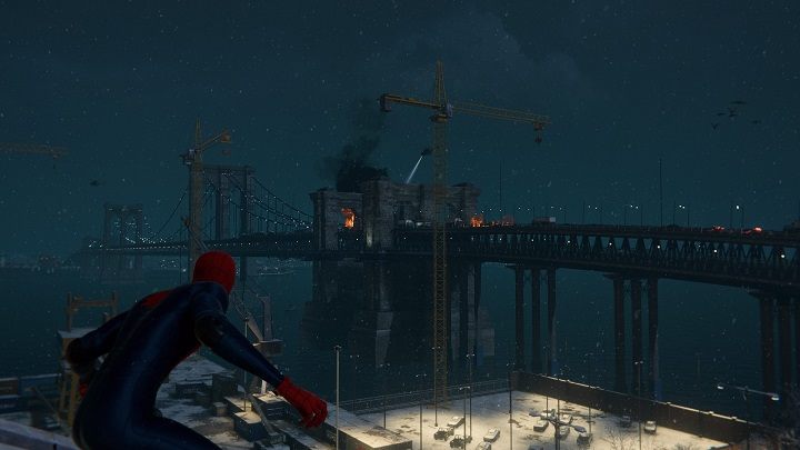 Gdy pozbędziesz się wrogów na wiecu, udaj się szybko w stronę mostu, na którym doszło do potężnej eksplozji - Spider-Man Miles Morales: Czas działać - solucja, opis przejścia - Spider-Man Miles Morales - poradnik, solucja