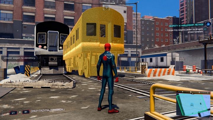 Przestaw znowu obrotnicę i przesuń na nią trzeci wagon znajdujący się na placu, na którym walczyłeś z przeciwnikami - Spider-Man Miles Morales: Kłopoty w harlemskim metrze - solucja, opis przejścia - Spider-Man Miles Morales - poradnik, solucja