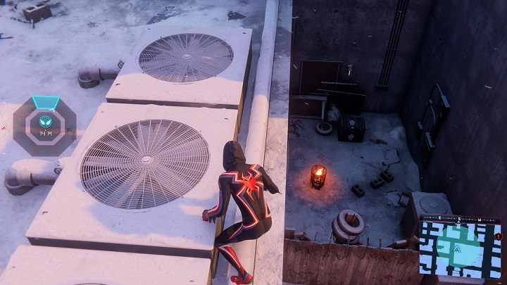 3) Kolejna skrytka jest między dachami budynku, we wschodnio-południowym rogu dzielnicy - Spider-Man Miles Morales: Skrytki Undergroundu - wszystkie lokacje, lista - Spider-Man Miles Morales - poradnik, solucja