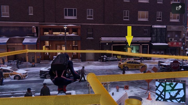 Po wybraniu tego zadania z aplikacji, udaj się do dzielnicy finansowej i porozmawiaj z chłopakiem w koszuli w czerwoną kratę - Spider-Man Miles Morales: Aktywności w aplikacji MSMZS - solucja, lista - Spider-Man Miles Morales - poradnik, solucja