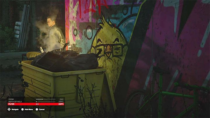 Miejsce zrobienia zdjęcia 3 - mural może być częściowo zasłonięty przez śmietnik - Hitman 3: Bird Art - jak odblokować trofeum/osiągnięcie? - Hitman 3 - poradnik, solucja