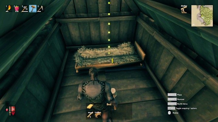 Wejdź do środka budynku i z menu mebli (Furniture) wybierz łóżko, które możesz postawić w pobliżu tylnej ściany schronienia - Valheim: Dzień 1 - jak przetrwać na początku? Od czego zacząć? - Valheim - poradnik do gry