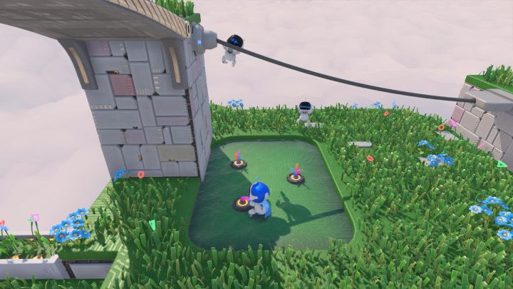 Idź do przodu i wskocz na wyższy poziom trawy - Astros Playroom: Wietrzna brama - solucja, opis przejścia - Astros Playroom - poradnik do gry