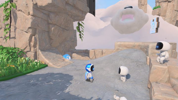 Pokonaj przeciwnika z kolcami i zjedź po trawie w dół, uważając na kolejnych wrogów - Astros Playroom: Wietrzna brama - solucja, opis przejścia - Astros Playroom - poradnik do gry