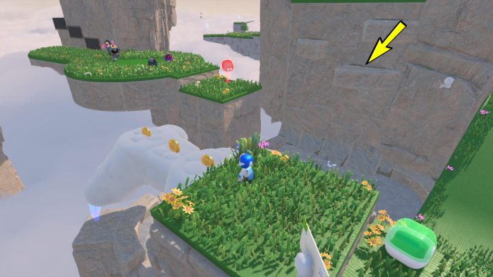 Użyj trampoliny aby dostać się na wyższy obszar, a następnie wskocz na chmurę - Astros Playroom: Wietrzna brama - solucja, opis przejścia - Astros Playroom - poradnik do gry