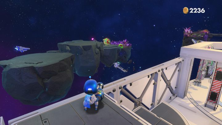 Gdy wskoczysz na skałę pojawi się kilku przeciwników - Astros Playroom: Głęboka przestrzeń danych - solucja, opis przejścia - Astros Playroom - poradnik do gry