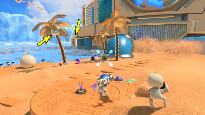 Niedaleko parasolek znajdziesz wystające kable w drewnianych deskach - Astros Playroom: Plaża botów - solucja, opis przejścia - Astros Playroom - poradnik do gry