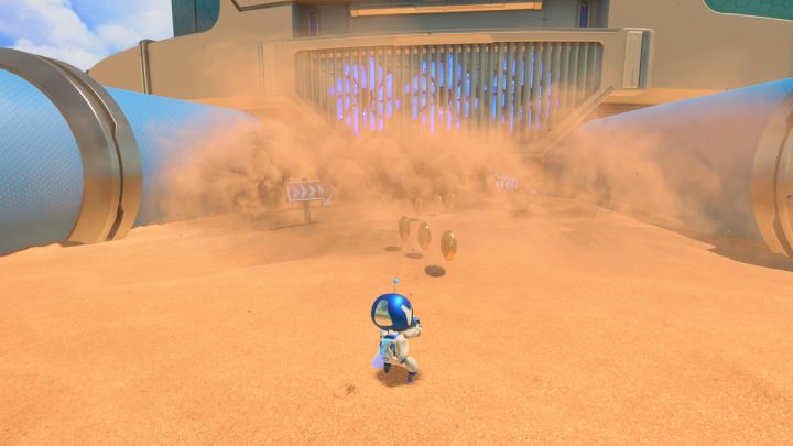 Wejdź w burzę piaskową między niebieskimi rurami - Astros Playroom: Plaża botów - solucja, opis przejścia - Astros Playroom - poradnik do gry