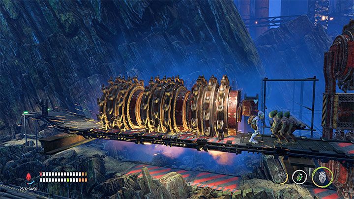 Powracamy ostrożnie na dół, przywołujemy do siebie 4 Mudokonów i rozpoczynamy z nimi podróż w lewo - Oddworld Soulstorm: Zejście na poziom Bone Processing, Necrum - solucja - Oddworld Soulstorm - poradnik do gry