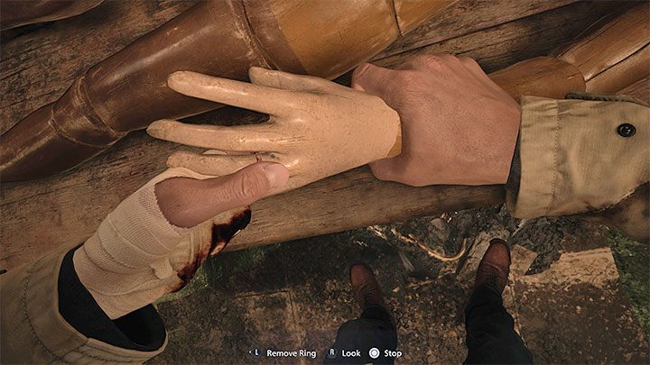 Na ciele dużej lalki znajduje się sporo interaktywnych punktów do zbadania, przy czym nie wszystkie je trzeba od razu zbadać, gdyż nie będziecie posiadali wszystkich przedmiotów niezbędnych do wchodzenia w interakcję z lalką - Resident Evil Village: House Beneviento, Zagadka z lalką kobiety - rozwiązanie - Resident Evil Village - poradnik do gry