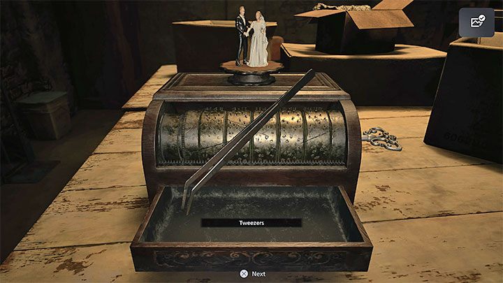 Nagrodą za odegranie całej melodii przez pozytywkę jest pęseta (Tweezers) - Resident Evil Village: House Beneviento, Zagadka z pozytywką - rozwiązanie - Resident Evil Village - poradnik do gry