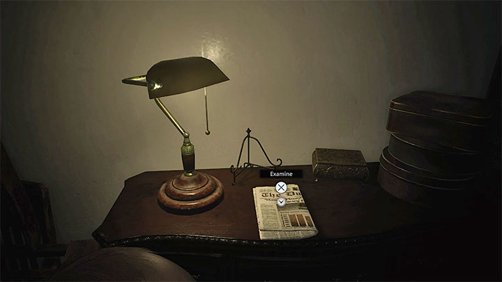 Gazeta leży na biurku obok zapalonej lampki - Resident Evil Village: Prolog - Akta (Files), lista wszystkich - Resident Evil Village - poradnik do gry