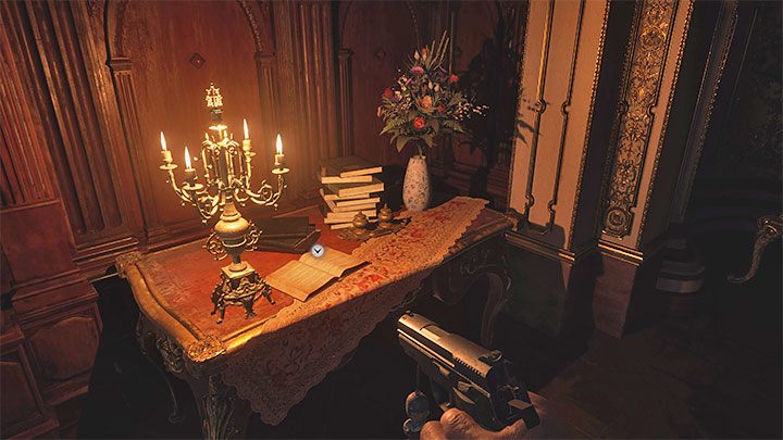 Księgę gości znajdziecie na stole obok świecznika, tuż po wejściu po raz pierwszy do zamku - Resident Evil Village: Zamek Dimitrescu - Akta (Files), lista wszystkich - Resident Evil Village - poradnik do gry