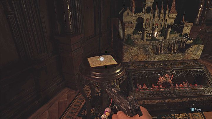 Książka jest w pomieszczeniu Merchants Room, czyli tym z maszyną do pisania, handlarzem Dukeem i zagadką-makietą zamku - Resident Evil Village: Zamek Dimitrescu - Akta (Files), lista wszystkich - Resident Evil Village - poradnik do gry