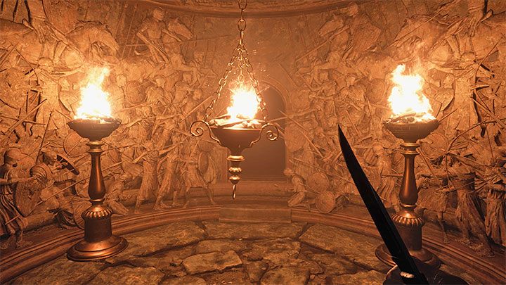 Podczas badania piwnicy zauważycie Lady Dimitrescu w pomieszczeniu Tasting Room, ale nie stanowi aktualnie zagrożenia dla Ethana - Resident Evil Village: Eksploracja zamkowych komnat/Castle Chambers - solucja - Resident Evil Village - poradnik do gry