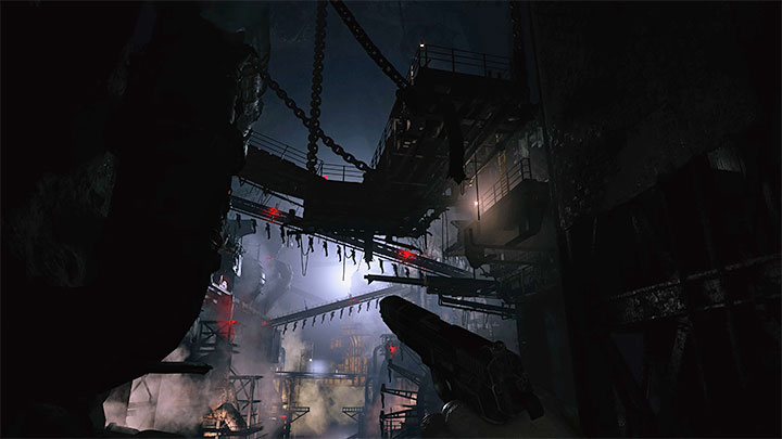 Kontynuujcie liniową przeprawę aż dotrzecie do głównej hali z liniami produkcyjnymi widocznymi w oddali - Resident Evil Village: Odblokowanie fabryki, odnalezienie Heisenberga - solucja - Resident Evil Village - poradnik do gry