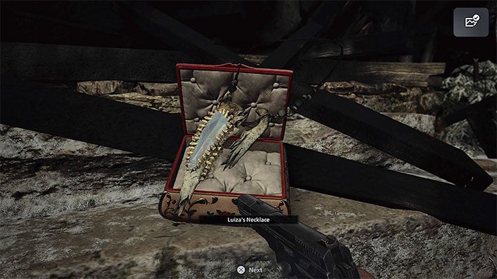 Ze skrzynki możecie wyjąć naszyjnik - Resident Evil Village: Zagadka z naszyjnikiem Luizas Necklace - rozwiązanie - Resident Evil Village - poradnik do gry