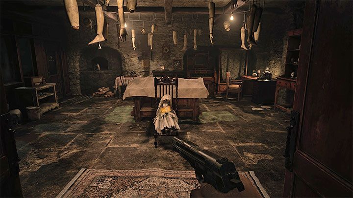 Po dotarciu do piwnicy możecie od razu wyruszyć głównym korytarzem, bo dokładnym badaniem wszystkich bocznych pomieszczeń piwnicy i tak obowiązkowo zajmiecie się za kilka chwil - Resident Evil Village: Dotarcie do domu władczyni lalek - solucja - Resident Evil Village - poradnik do gry