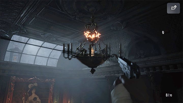 Czwarty ścian wymaga skorzystania z małych schodów w pomieszczeniu - Resident Evil Village: Zagadka z 5 dzwonami - rozwiązanie - Resident Evil Village - poradnik do gry