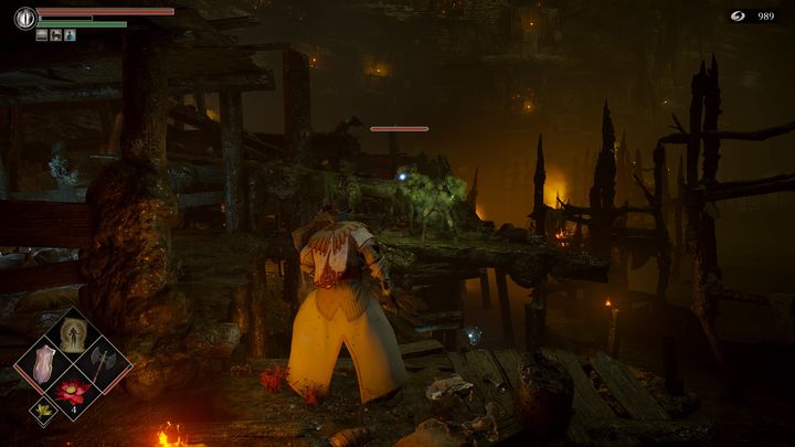 Po pokonaniu większości przeciwników, skupcie się na likwidacji wroga, który atakuje zielonymi czarami, gdyż będzie on Was regularnie zatruwał - Demons Souls Remake: Bagno smutku (5-2) - solucja, opis przejścia - Demons Souls Remake - poradnik do gry