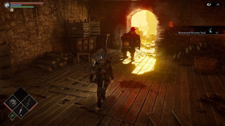 Na górze napotkacie pierwszego przeciwnika, oficjela, który atakuje głównie za pomocą magii ognia - Demons Souls Remake: Kuźnie (2-1) - solucja, opis przejścia - Demons Souls Remake - poradnik do gry