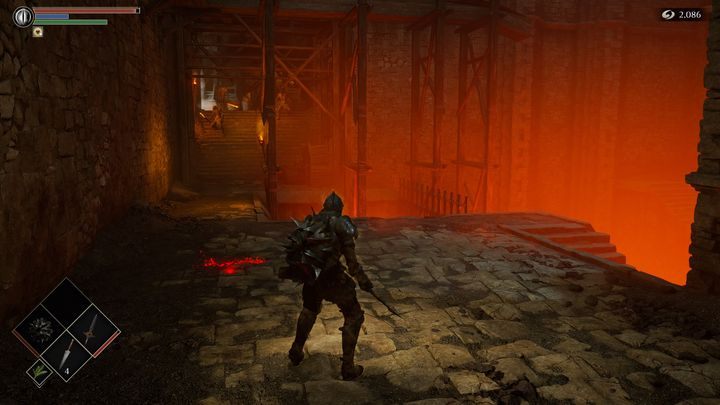 Wychodząc z kotła, po prawej stronie znajdują się dwie ścieżki - Demons Souls Remake: Kuźnie (2-1) - solucja, opis przejścia - Demons Souls Remake - poradnik do gry