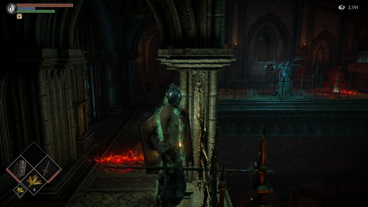 Po lewej stronie zauważycie pierwszego przeciwnika, jest to humanoid z głową ośmiornicy - Demons Souls Remake: Więzienie Nadziei (3-1) - solucja, opis przejścia - Demons Souls Remake - poradnik do gry