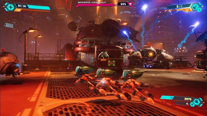 Pierwszy z podstawowych ataków bossa to ostrzał rakietowy z wykorzystaniem niebieskich pocisków - Ratchet & Clank Rift Apart: Niszczyciel Nefariousa - jak pokonać? - Ratchet & Clank Rift Apart - poradnik do gry