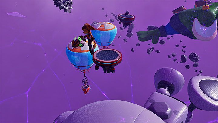 Musicie pokonać mało skomplikowany tor przeszkód, który wiąże się z odbijaniem od dużych balonów - Ratchet & Clank Rift Apart: Nefarious City - znajdźki, lista wszystkich, mapa - Ratchet & Clank Rift Apart - poradnik do gry