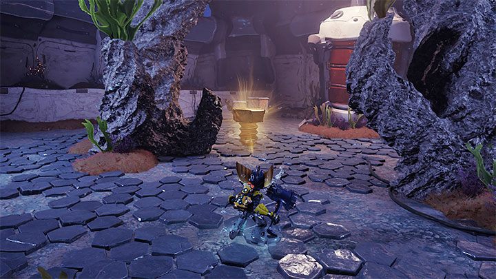W nowym górnym obszarze śrubkę znajdziecie za skałami - Ratchet & Clank Rift Apart: Cordelion - znajdźki, lista wszystkich, mapa - Ratchet & Clank Rift Apart - poradnik do gry