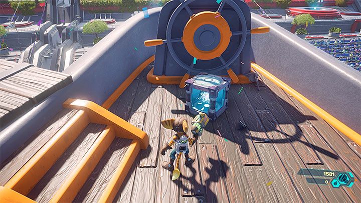 W celu wyleczenia postaci musicie odnajdywać skrzynki ze zdrowiem - przykładową pokazuje obrazek - Ratchet & Clank Rift Apart: Leczenie - jak odzyskiwać zdrowie? - Ratchet & Clank Rift Apart - poradnik do gry