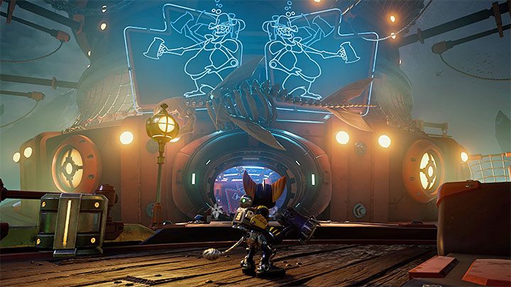 Opcjonalna ścieżka doprowadzi Was do tawerny, w której jest do stoczenia większa bitwa z piratami - Ratchet & Clank Rift Apart: Lokalizator znajdziek/Mapotron - jak zdobyć? - Ratchet & Clank Rift Apart - poradnik do gry