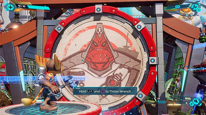 Ustawcie się na kolejnej okrągłej platformie - Ratchet & Clank Rift Apart: Parada - solucja, opis przejścia - Ratchet & Clank Rift Apart - poradnik do gry