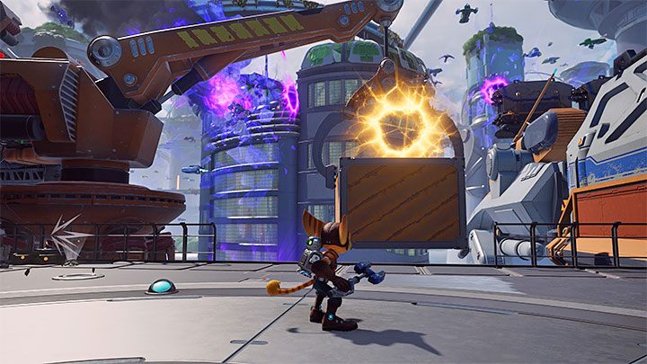 Liniowa trasa przemarszu docelowo doprowadzi Was do lokacji, w której do rozwiązania jest zagadka z dźwigami i szczelinami - Ratchet & Clank Rift Apart: Pościg za doktorem Nefariousem - solucja - Ratchet & Clank Rift Apart - poradnik do gry