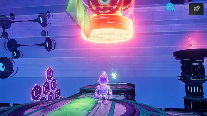 Ze sferą podniesienia udajcie się do pracującej lewej maszyny z powyższego obrazka - Ratchet & Clank Rift Apart: Zbadanie anomalii, kryjówka Rivet - solucja - Ratchet & Clank Rift Apart - poradnik do gry