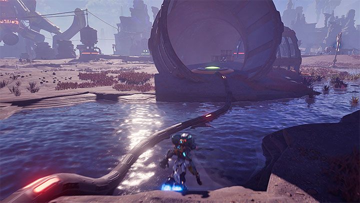 Zwróćcie uwagę na gruby kabel odchodzący od kopuły otaczającej ołtarzyk - Ratchet & Clank Rift Apart: Zdobycie wiedzy lombaków - solucja, kapliczki - Ratchet & Clank Rift Apart - poradnik do gry