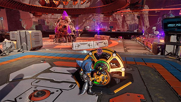 Na potrzeby rozegrania pojedynku z opisywanym na tej stronie bossem musicie w trakcie wizyty na planecie Blizar Prime dotrzeć do miejsca, w którym otrzymacie obowiązkowy cel misji dotyczący użycia wielkiego wiertła do zdobycia kwarca fazowego - Ratchet & Clank Rift Apart: Desantowiec opryszków, Blizar Prime - jak pokonać? - Ratchet & Clank Rift Apart - poradnik do gry