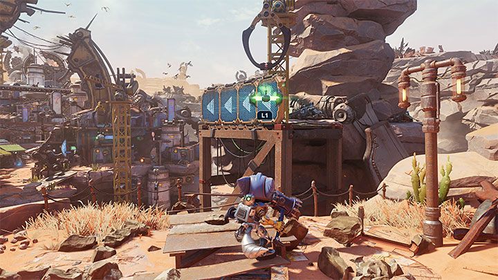 W drodze do wioski musicie w miejscu z obrazka złapcie się zaczepu, rozbujać się na linie i przebiec po pobliskiej ścianie - Ratchet & Clank Rift Apart: Znalezienie Naprawiacza i wyrzutnika - solucja - Ratchet & Clank Rift Apart - poradnik do gry