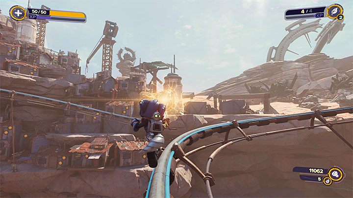 W dalszej fazie przejażdżki skorzystajcie z okazji żeby szybko przyciągnąć się do szczeliny z powyższego obrazka - Ratchet & Clank Rift Apart: Znalezienie Naprawiacza i wyrzutnika - solucja - Ratchet & Clank Rift Apart - poradnik do gry