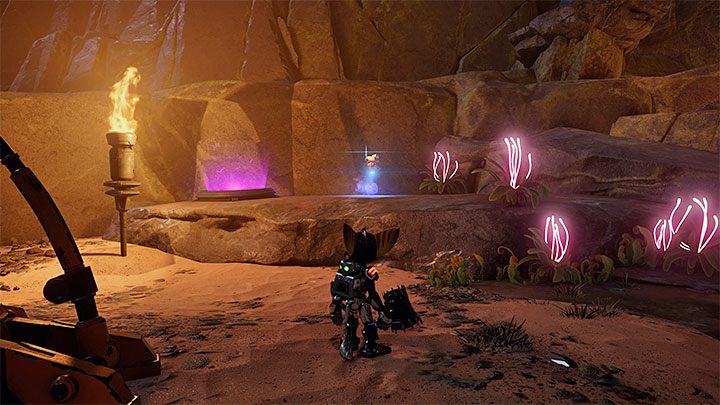 Zanim zajmiecie się aktualnym głównym celem misji chyżuk może Wam pomóc w pozyskaniu dwóch znajdziek z okolicy - Ratchet & Clank Rift Apart: Zaliczenie pirackich prób - solucja - Ratchet & Clank Rift Apart - poradnik do gry